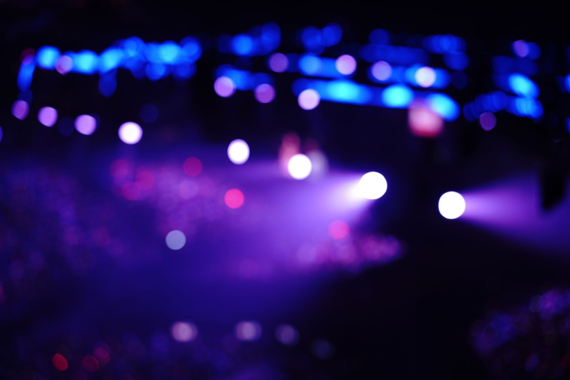 Defocused entertainment concert lighting on stage, blurred disco party and Concert Live